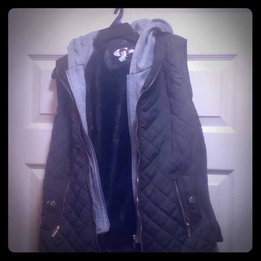 Green vest with attached hood